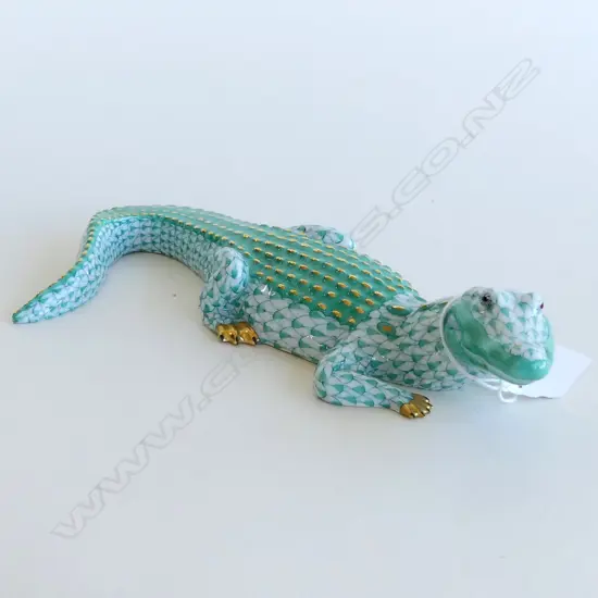 A Herend Porcelain crocodilein green 'fishnet' pattern